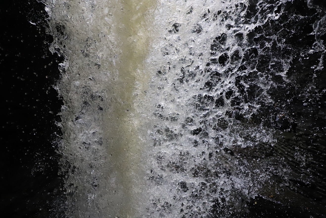 Under a waterfall