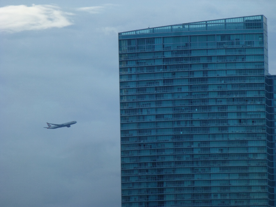 Airplane and a skyscraper